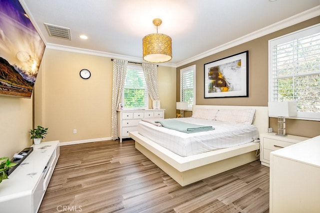 5764 Alcala Way, Riverside, CA 92505 - bedroom with crown molding, light wood finished floors, baseboards, and recessed lighting