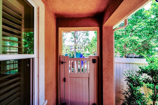 5764 Alcala Way, Riverside, CA 92505 - view of exterior entry featuring a gate and stucco siding