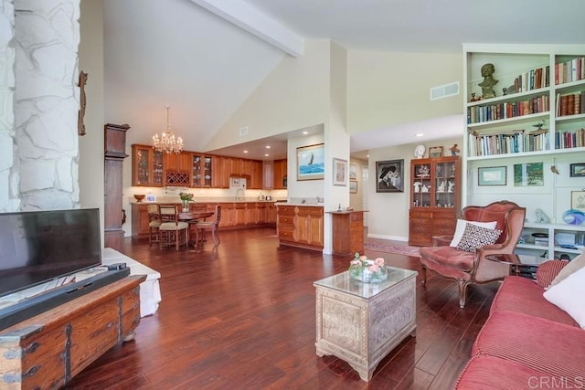 1129 La Casa, San Marcos, CA 92078 - living room featuring beam ceiling, a chandelier, dark wood-type flooring, and high vaulted ceiling