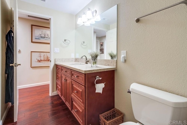 1129 La Casa, San Marcos, CA 92078 - bathroom featuring wood finished floors and vanity