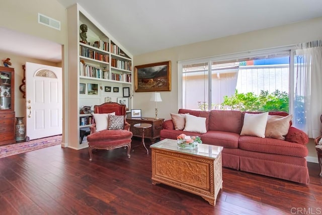 1129 La Casa, San Marcos, CA 92078 - living room featuring lofted ceiling, dark wood-style flooring, and built in features