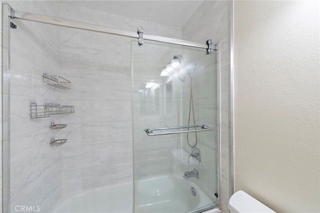 25311 Misty Rdg, Mission Viejo, CA 92692 - full bath featuring toilet, combined bath / shower with glass door, and a textured wall