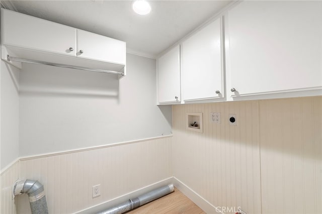 25311 Misty Rdg, Mission Viejo, CA 92692 - washroom with cabinet space, hookup for an electric dryer, washer hookup, wainscoting, and light wood finished floors