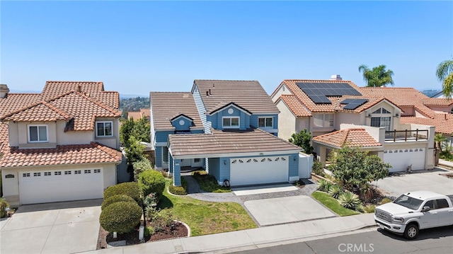 25311 Misty Rdg, Mission Viejo, CA 92692 - mediterranean / spanish-style home with a tile roof, concrete driveway, and stucco siding