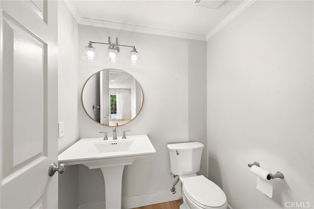 25311 Misty Rdg, Mission Viejo, CA 92692 - half bathroom with toilet, ornamental molding, wood finished floors, and baseboards