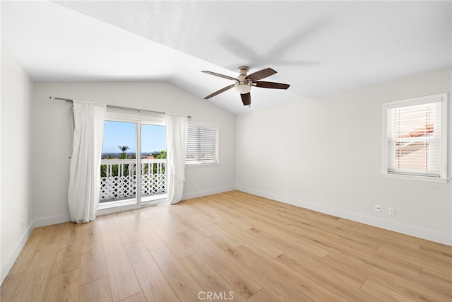 25311 Misty Rdg, Mission Viejo, CA 92692 - empty room with a ceiling fan, light wood finished floors, baseboards, and lofted ceiling