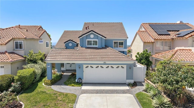 25311 Misty Rdg, Mission Viejo, CA 92692 - view of front facade with a tiled roof, driveway, and a garage