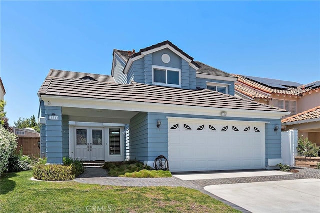 25311 Misty Rdg, Mission Viejo, CA 92692 - view of front facade featuring a tiled roof and driveway