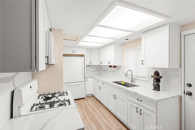 233 Glen Avon Dr, Cedar Glen, CA 92321 - kitchen with white appliances, a sink, and white cabinetry