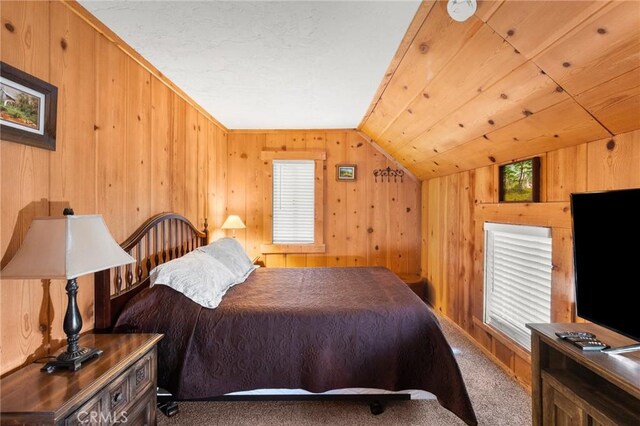 233 Glen Avon Dr, Cedar Glen, CA 92321 - bedroom featuring carpet floors, wooden walls, and vaulted ceiling