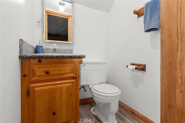 233 Glen Avon Dr, Cedar Glen, CA 92321 - bathroom with wood finished floors, toilet, vanity, and baseboards