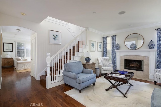 114 Via Monte Picayo, San Clemente, CA 92673 - living area featuring plenty of natural light, hardwood / wood-style floors, crown molding, stairway, and arched walkways