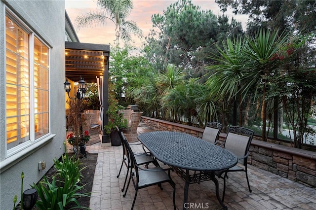 114 Via Monte Picayo, San Clemente, CA 92673 - patio terrace at dusk featuring a patio area and outdoor dining area