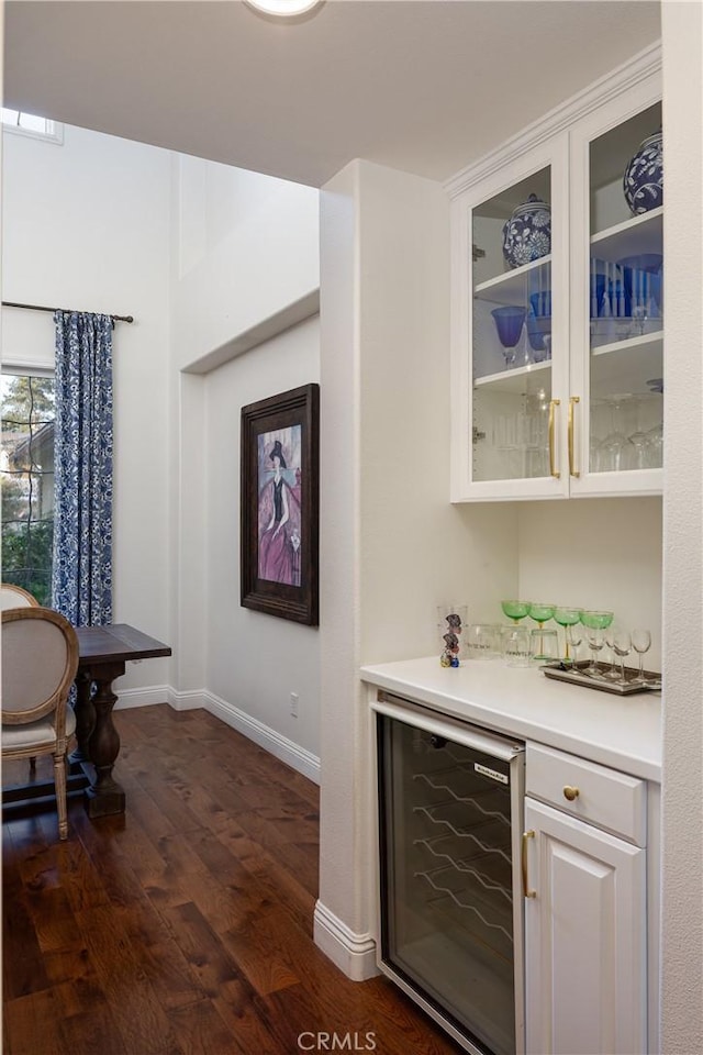 114 Via Monte Picayo, San Clemente, CA 92673 - indoor dry bar featuring beverage cooler, dark wood-style flooring, and baseboards
