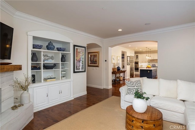 114 Via Monte Picayo, San Clemente, CA 92673 - living room featuring crown molding, arched walkways, dark wood-style floors, baseboards, and recessed lighting