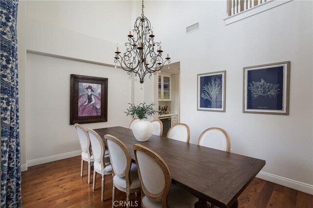 114 Via Monte Picayo, San Clemente, CA 92673 - dining area with a chandelier, wood finished floors, and a high ceiling