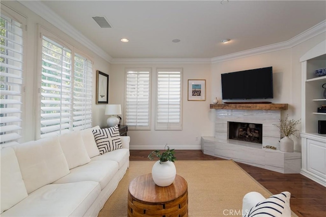 114 Via Monte Picayo, San Clemente, CA 92673 - living area featuring wood finished floors, crown molding, a high end fireplace, and recessed lighting