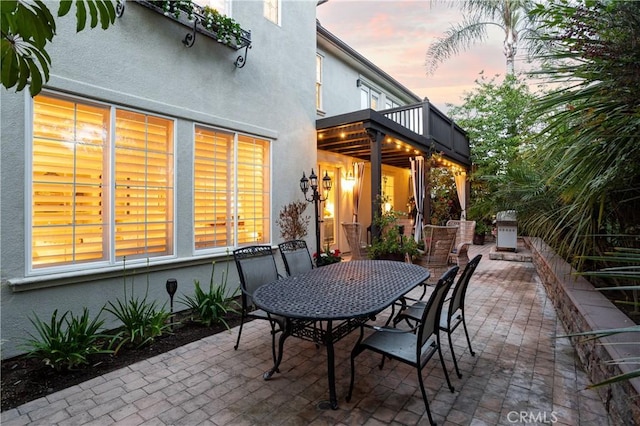 114 Via Monte Picayo, San Clemente, CA 92673 - patio terrace at dusk with a patio area and outdoor dining area