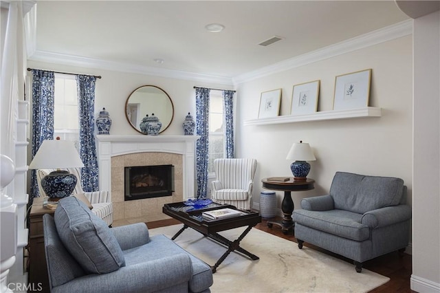 114 Via Monte Picayo, San Clemente, CA 92673 - living area featuring ornamental molding, plenty of natural light, wood finished floors, and a tiled fireplace