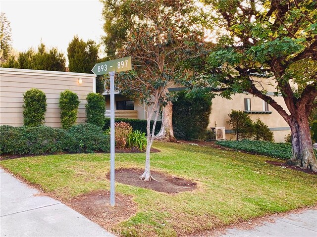897 Ronda Sevilla C, Laguna Woods, CA 92637 - view of front facade featuring a front yard