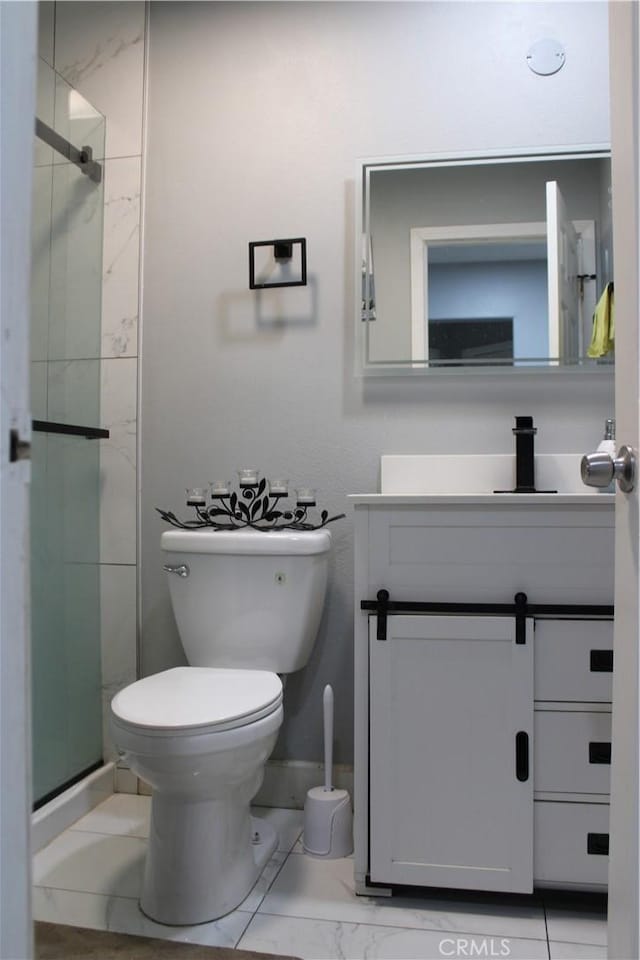 3360 Winstrom St, Riverside, CA 92504 - bathroom featuring vanity, a stall shower, and marble look tiles