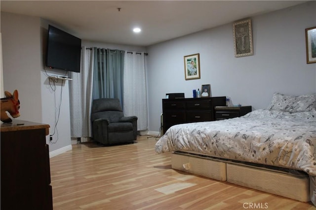 3360 Winstrom St, Riverside, CA 92504 - bedroom featuring wood finished floors and recessed lighting