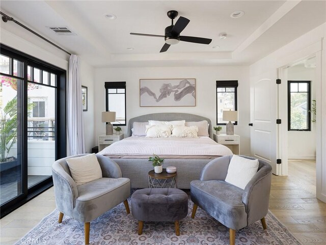 618 W Elm Ave, El Segundo, CA 90245 - bedroom with a raised ceiling, light wood finished floors, a ceiling fan, access to exterior, and recessed lighting