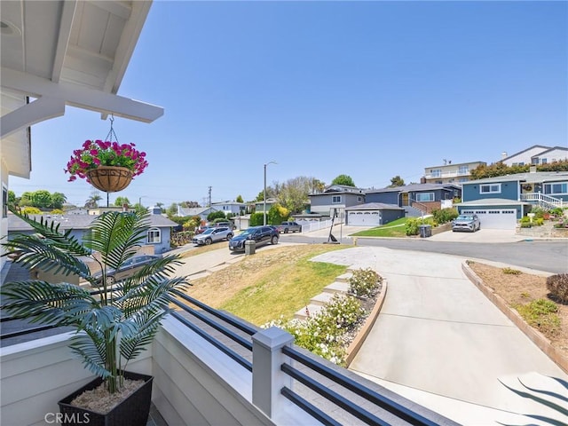618 W Elm Ave, El Segundo, CA 90245 - view of yard with a residential view, driveway, and a balcony