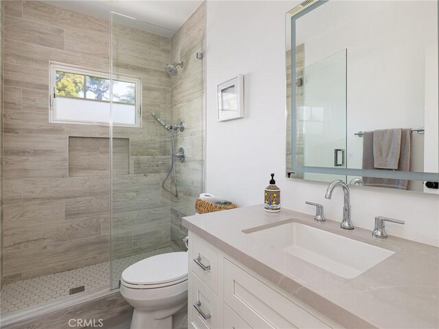 618 W Elm Ave, El Segundo, CA 90245 - full bathroom with vanity, toilet, and tiled shower