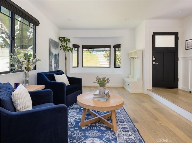 618 W Elm Ave, El Segundo, CA 90245 - living room with light wood-style flooring and healthy amount of natural light