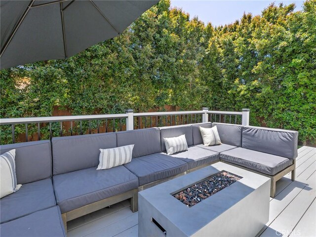 618 W Elm Ave, El Segundo, CA 90245 - wooden terrace with an outdoor living space with a fire pit