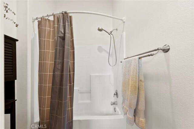 42302 Oregon Trl, Murrieta, CA 92562 - bathroom featuring shower / bath combination with curtain