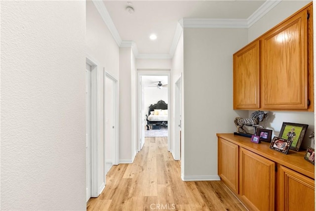 42302 Oregon Trl, Murrieta, CA 92562 - corridor featuring light wood finished floors, ornamental molding, baseboards, and recessed lighting