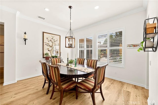 42302 Oregon Trl, Murrieta, CA 92562 - dining space featuring light wood-style flooring, a chandelier, baseboards, crown molding, and recessed lighting