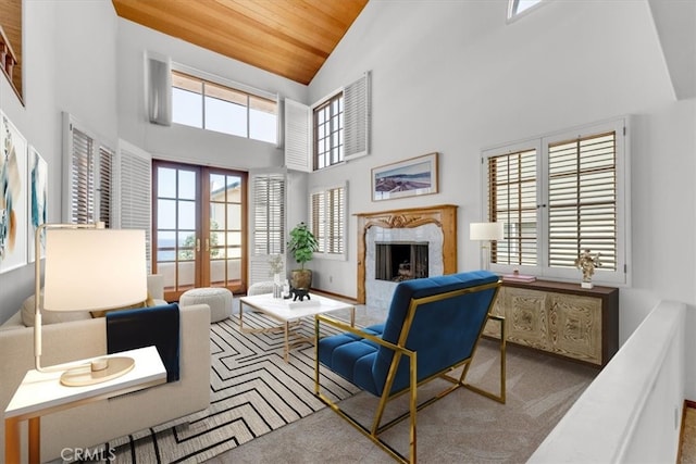 1110 Esplanade Unit 6, Redondo Beach, CA 90277 - carpeted living area featuring a premium fireplace, wood ceiling, high vaulted ceiling, and french doors