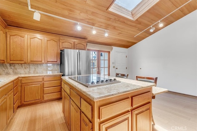1110 Esplanade Unit 6, Redondo Beach, CA 90277 - kitchen featuring track lighting, freestanding refrigerator, electric stovetop, wood ceiling, and light wood-style flooring