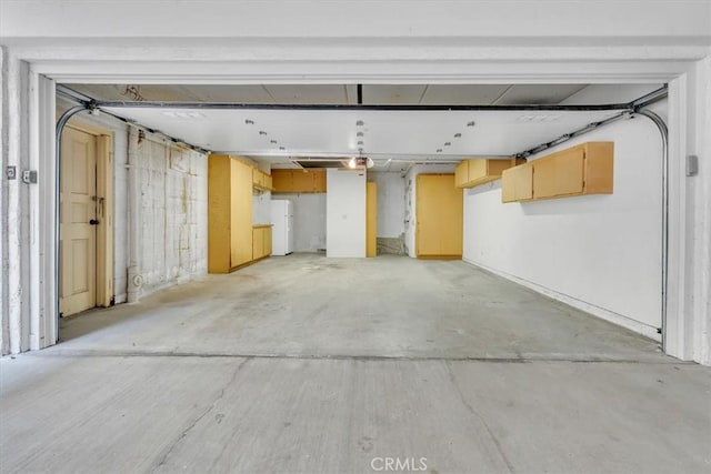 1110 Esplanade Unit 6, Redondo Beach, CA 90277 - garage featuring freestanding refrigerator