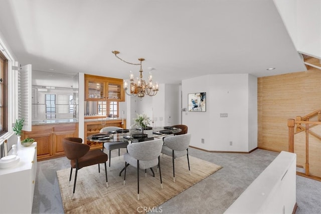 1110 Esplanade Unit 6, Redondo Beach, CA 90277 - dining area featuring a chandelier, light carpet, and baseboards