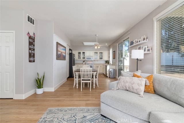 43340 Corte Barbaste, Temecula, CA 92592 - living area with light wood finished floors, baseboards, and ceiling fan