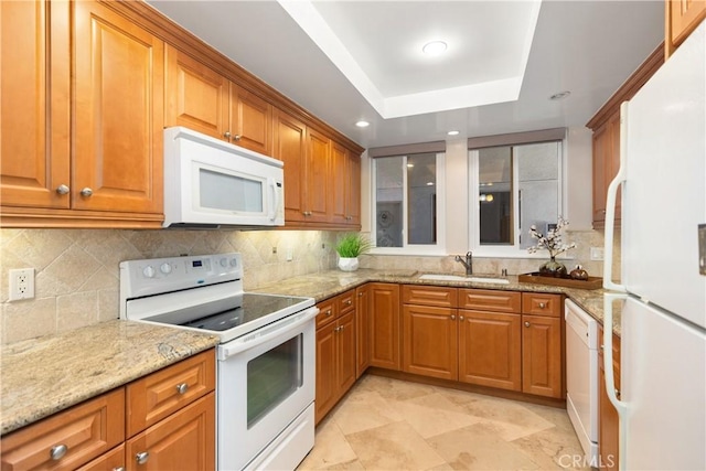 124 Via Estrada Unit O, Laguna Woods, CA 92637 - kitchen with white appliances, a sink, brown cabinets, and recessed lighting