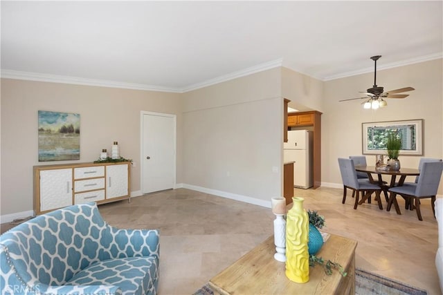 124 Via Estrada Unit O, Laguna Woods, CA 92637 - living room featuring crown molding, a ceiling fan, and baseboards