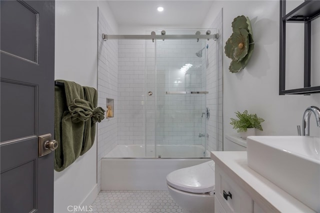 1322 N June St, Los Angeles, CA 90028 - full bathroom with toilet, bath / shower combo with glass door, vanity, tile patterned flooring, and recessed lighting
