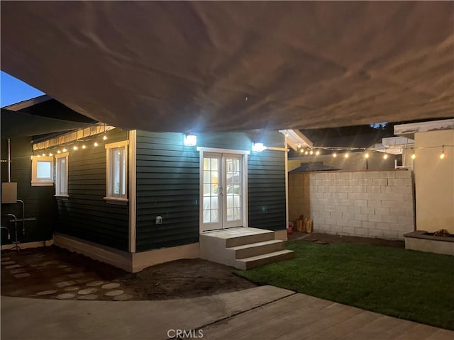 1322 N June St, Los Angeles, CA 90028 - exterior entry at twilight with french doors