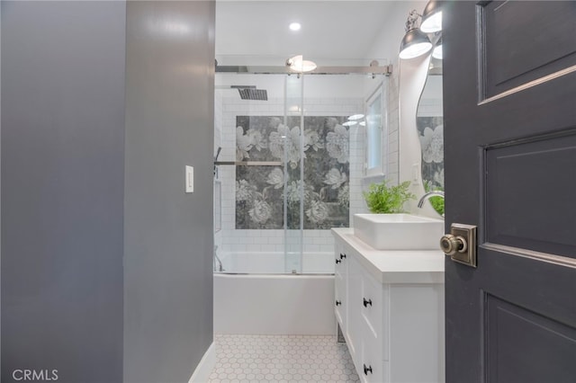 1322 N June St, Los Angeles, CA 90028 - full bath with vanity, shower / bath combination with glass door, baseboards, and recessed lighting