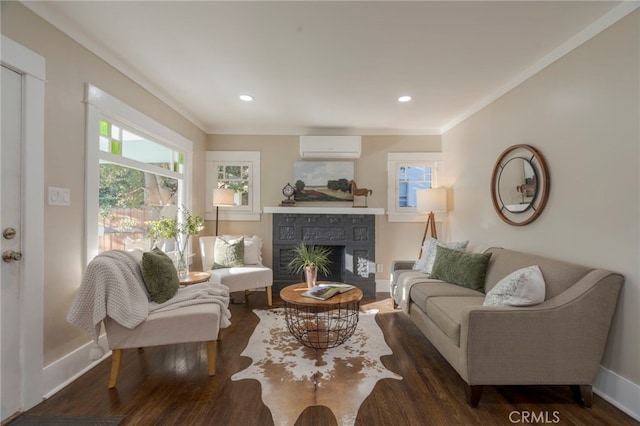 1322 N June St, Los Angeles, CA 90028 - living room with a wall mounted air conditioner, a fireplace, wood finished floors, baseboards, and crown molding