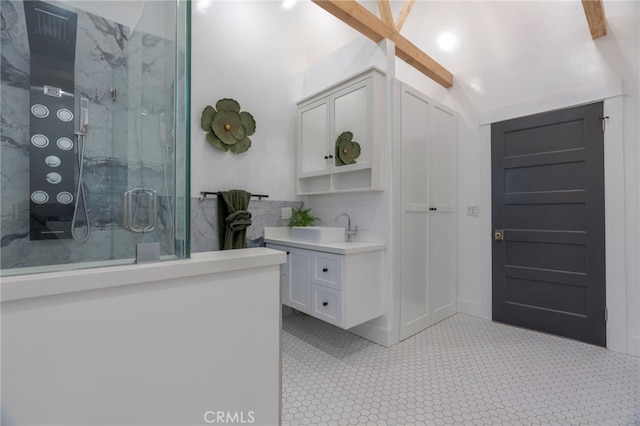 1322 N June St, Los Angeles, CA 90028 - bathroom featuring a marble finish shower and vanity