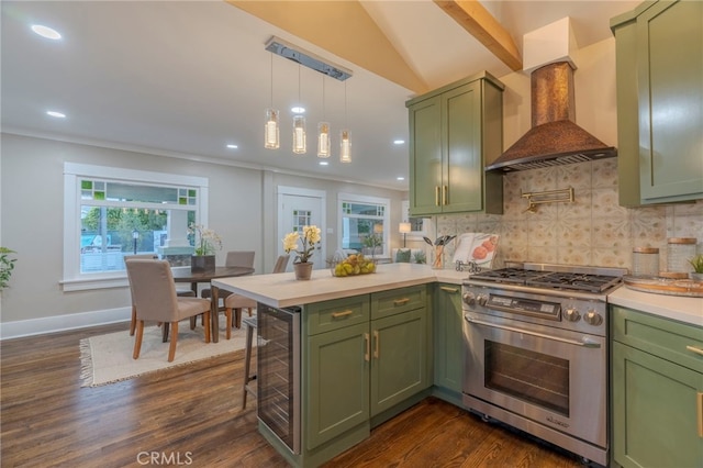 1322 N June St, Los Angeles, CA 90028 - kitchen with green cabinets, high end stainless steel range oven, premium range hood, wine cooler, and recessed lighting
