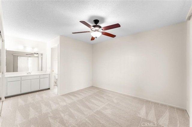 8313 Vineyard Ave # 6, Rancho Cucamonga, CA 91730 - empty room with ceiling fan, light colored carpet, and a textured ceiling