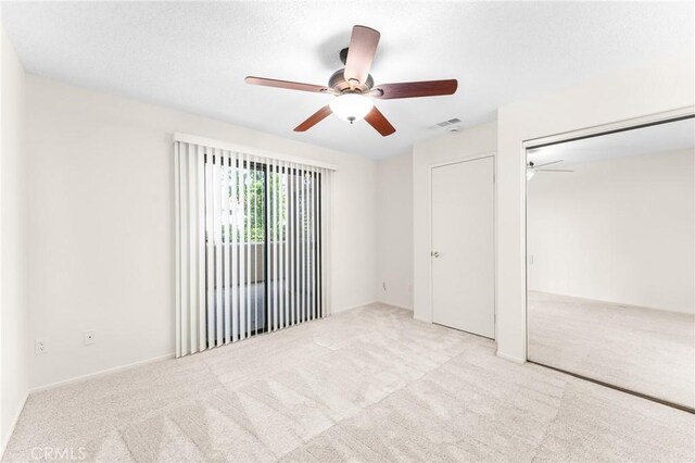 8313 Vineyard Ave # 6, Rancho Cucamonga, CA 91730 - unfurnished bedroom featuring carpet and ceiling fan