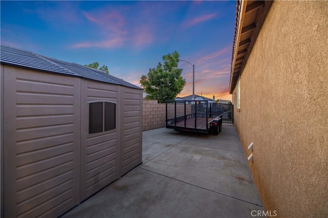 5058 Meadowsweet Dr, Palmdale, CA 93551 - patio terrace at dusk with a patio and a fenced backyard